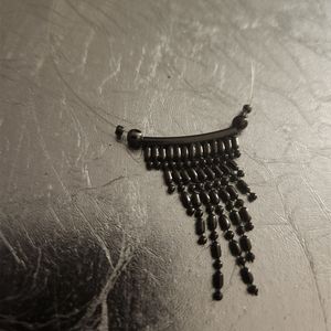 Invisible floating gunmetal bead necklace